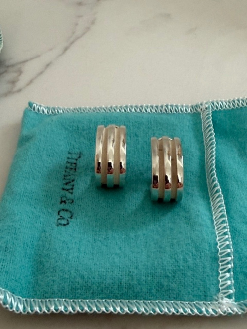 Tiffany & Co. Silver Triple-Band Hoop Earrings on Tiffany Blue Pouch